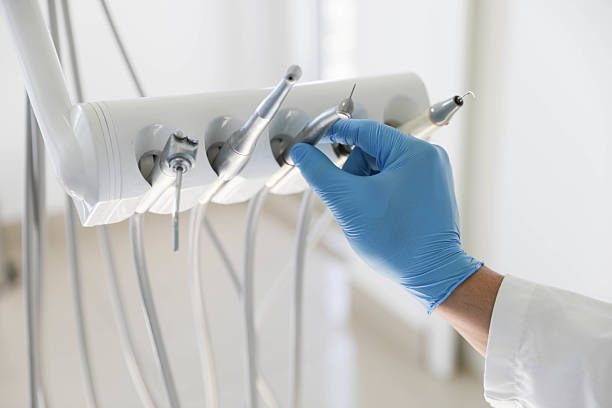 Professional Root Canal Treatment technician working in Lake LeAnn, MI